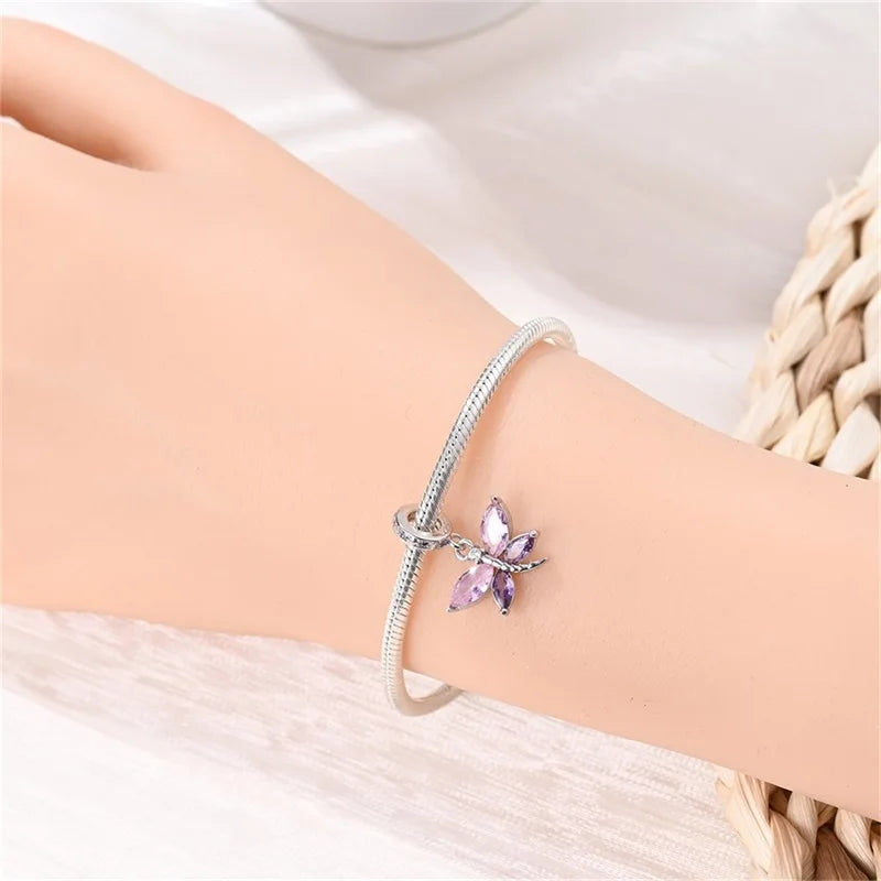 Butterfly charm beads attached to bracelet