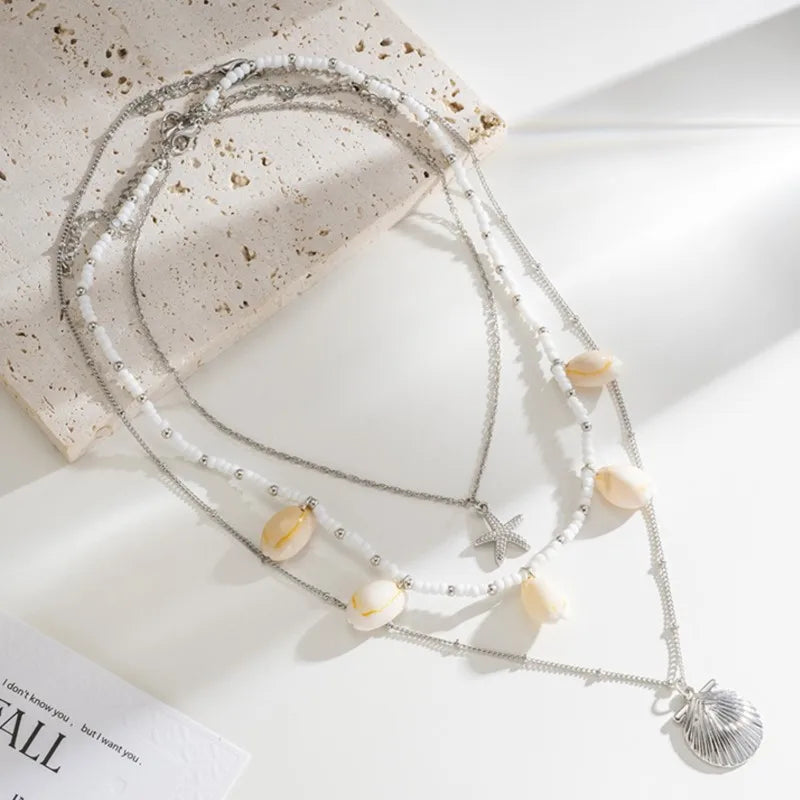 Pearl shell starfish necklace pendant close-up