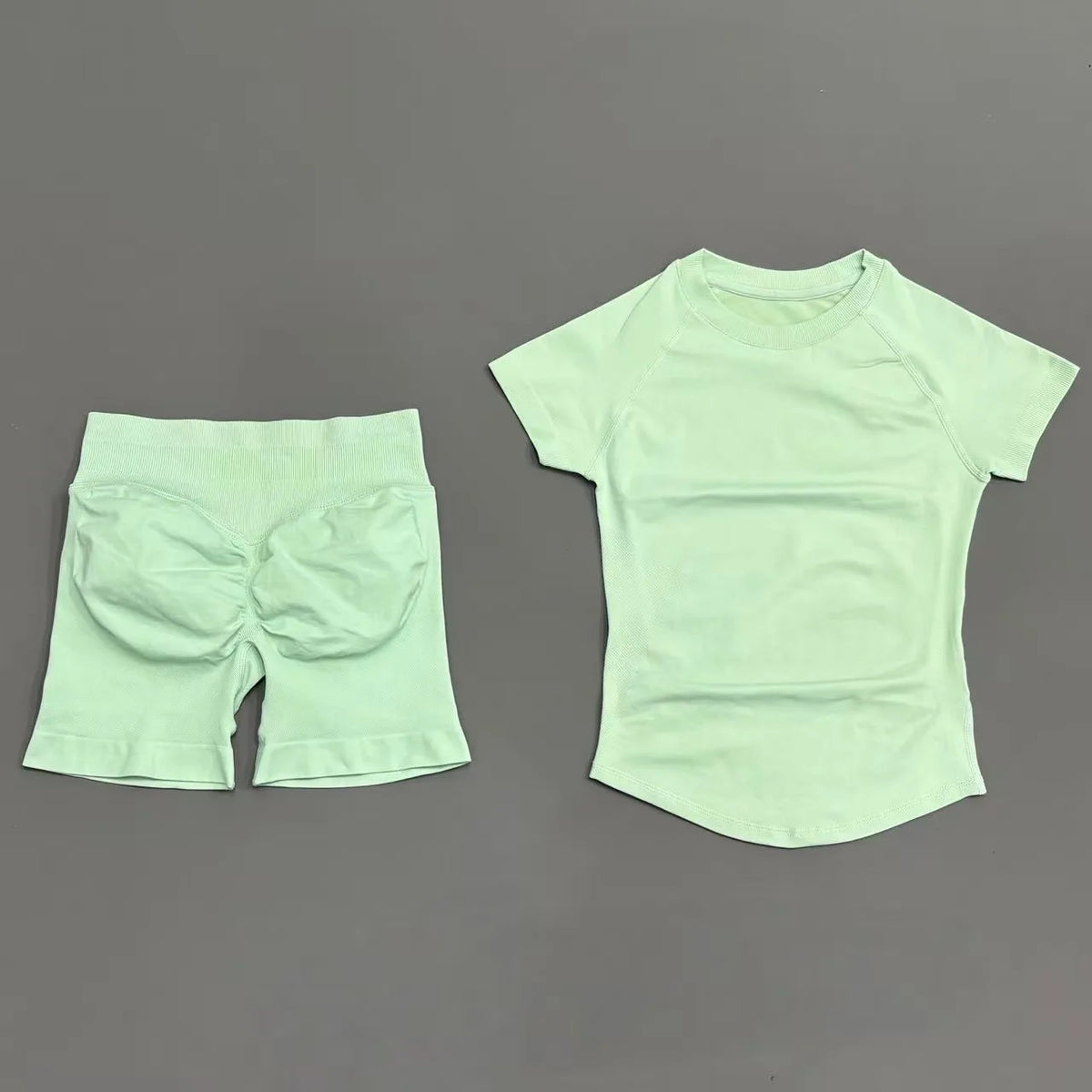 Seamless yoga workout set pine green front view