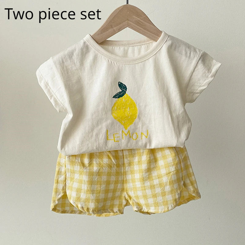 Baby sleeveless pajama set worn on baby