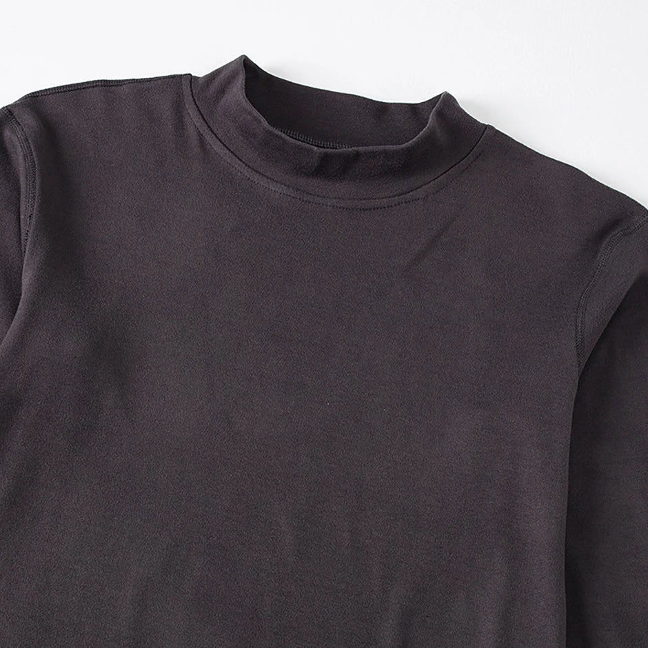 Men's semi-turtleneck long sleeve top worn under jacket
