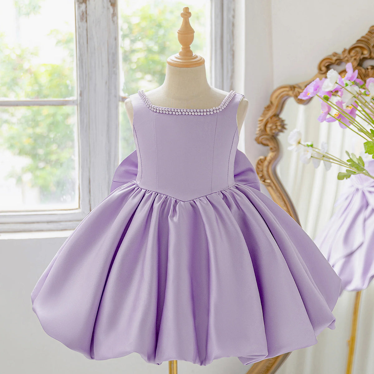 Girls bow tutu party dress worn by child
