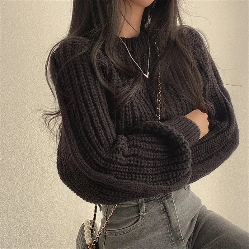 Loose korean sweater black worn close up front