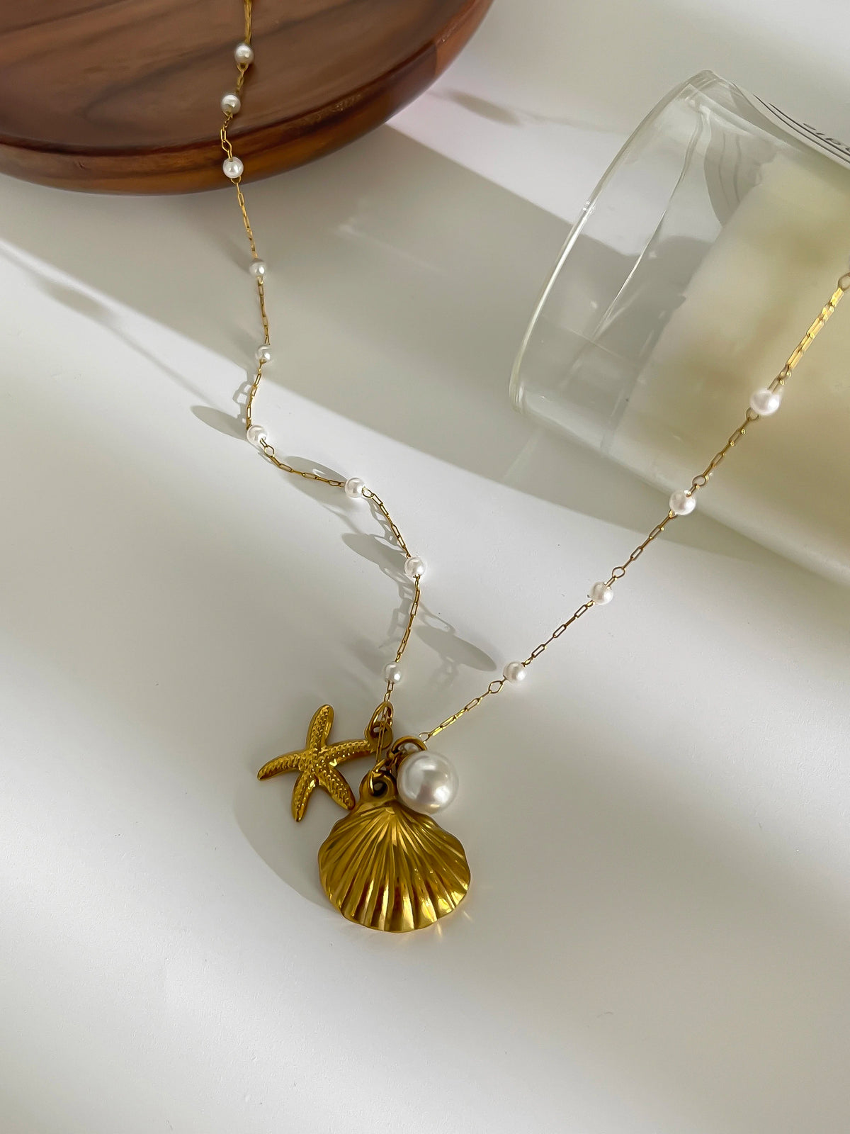 Pearl starfish shell necklace full view gold