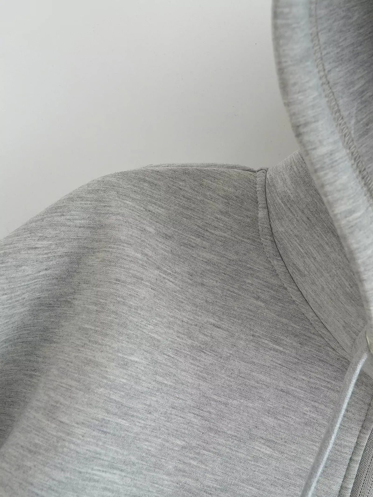Women's zip-up hoodie jacket front view dark grey