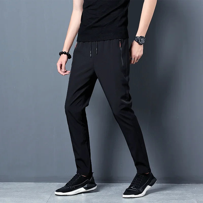 Men's slim fit Korean jogger trousers front view dark grey