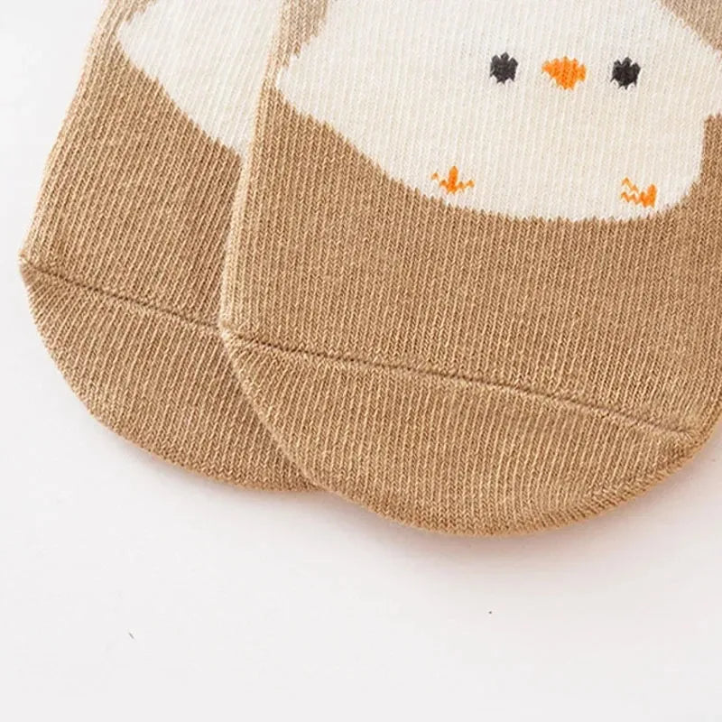 Kids non-slip socks worn on child feet