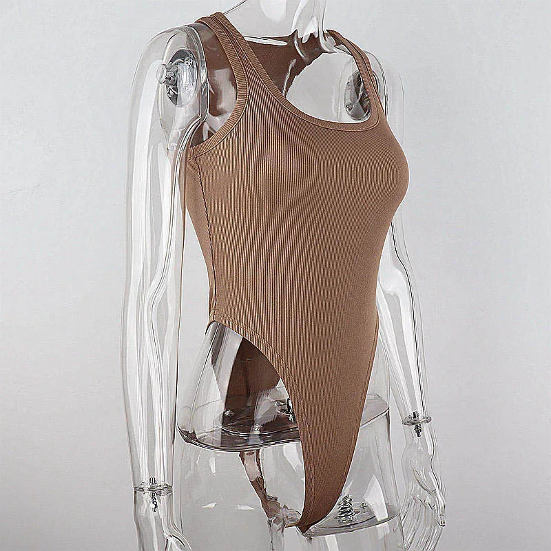 Off shoulder halter bodysuit worn with jeans
