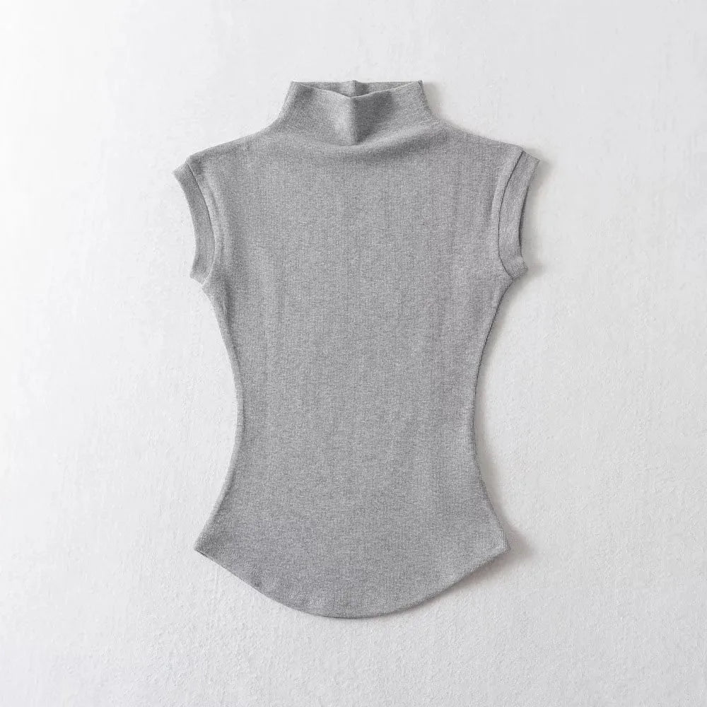 Sleeveless turtleneck top styled for summer