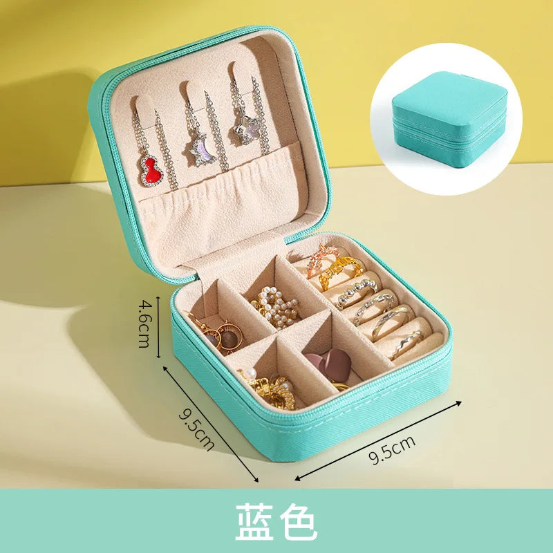 Travel jewelry organizer case interior compartments