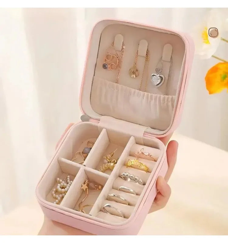 Travel jewelry organizer case interior compartments