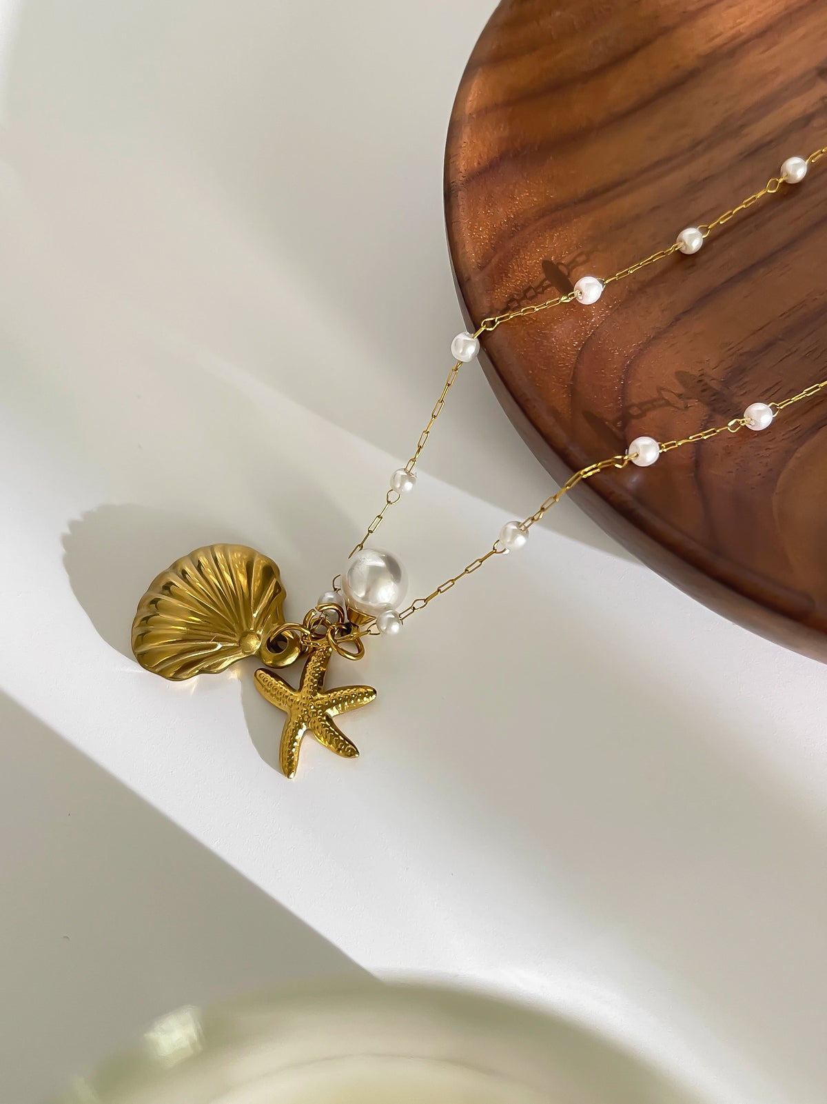 Pearl starfish shell necklace full view gold