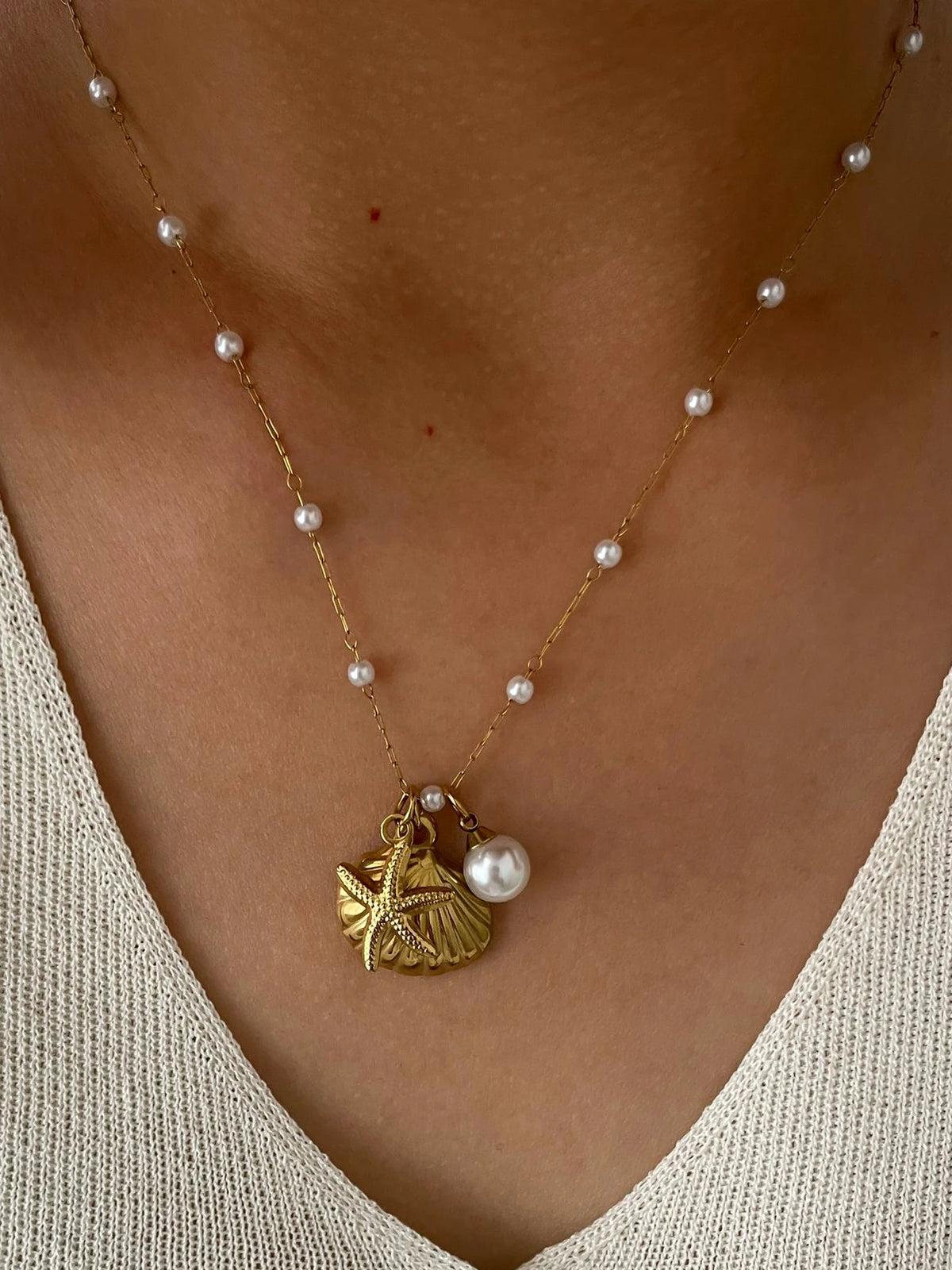 Pearl starfish shell necklace full view gold
