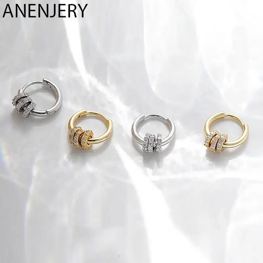Sleek circle hoop earrings worn on ear