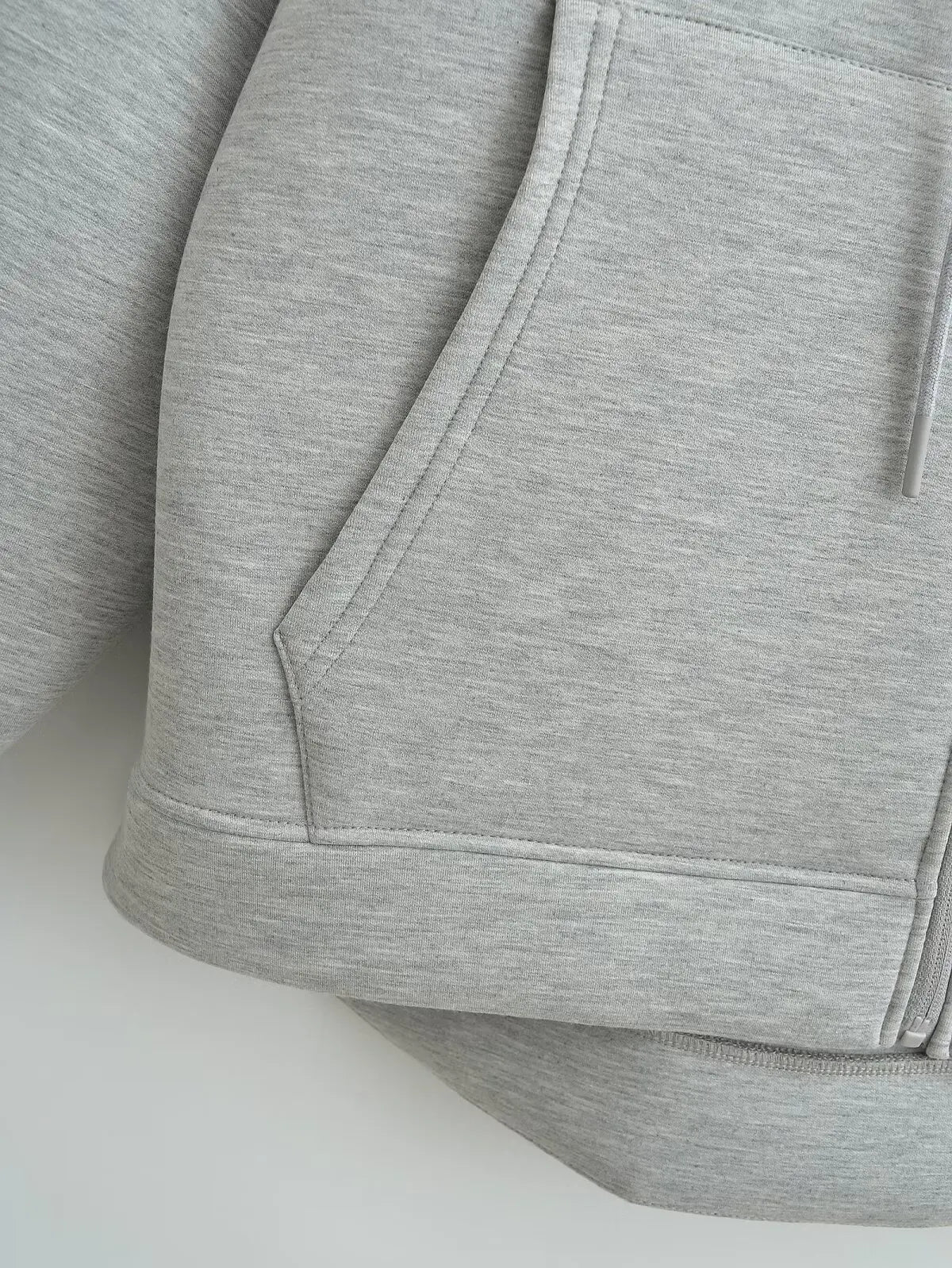 Women's zip-up hoodie jacket front view dark grey