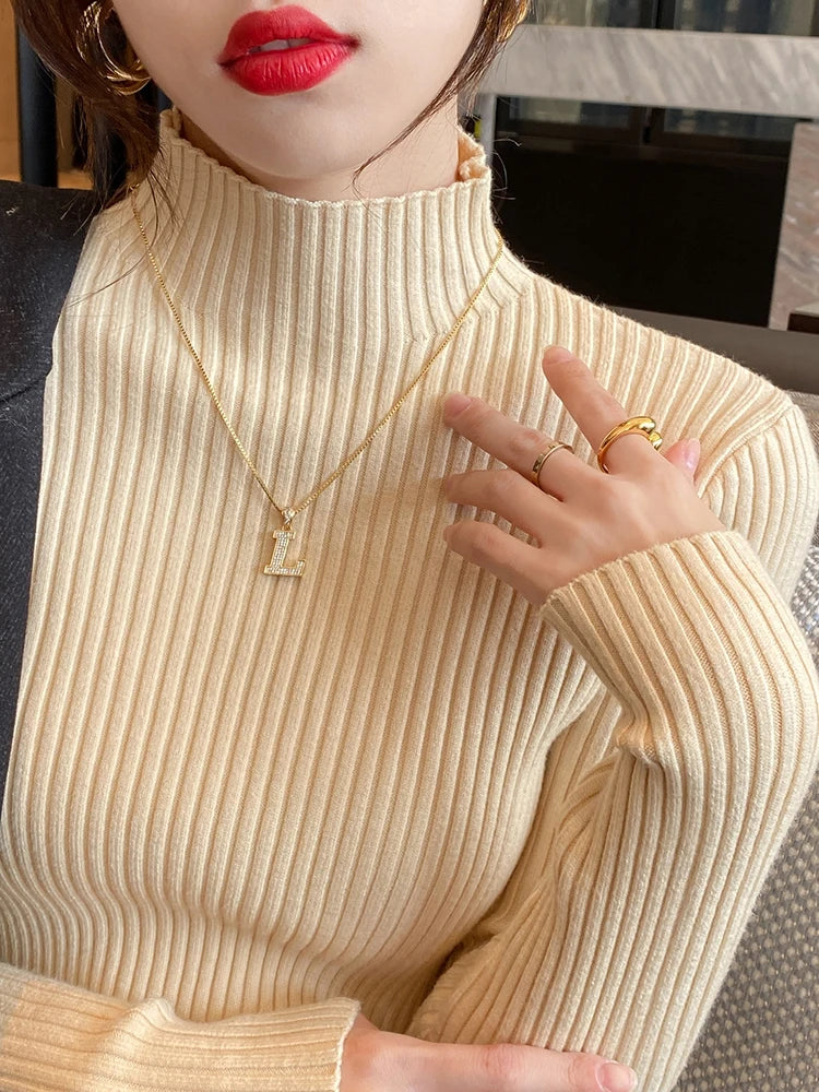 Slim turtleneck sweater khaki worn close up