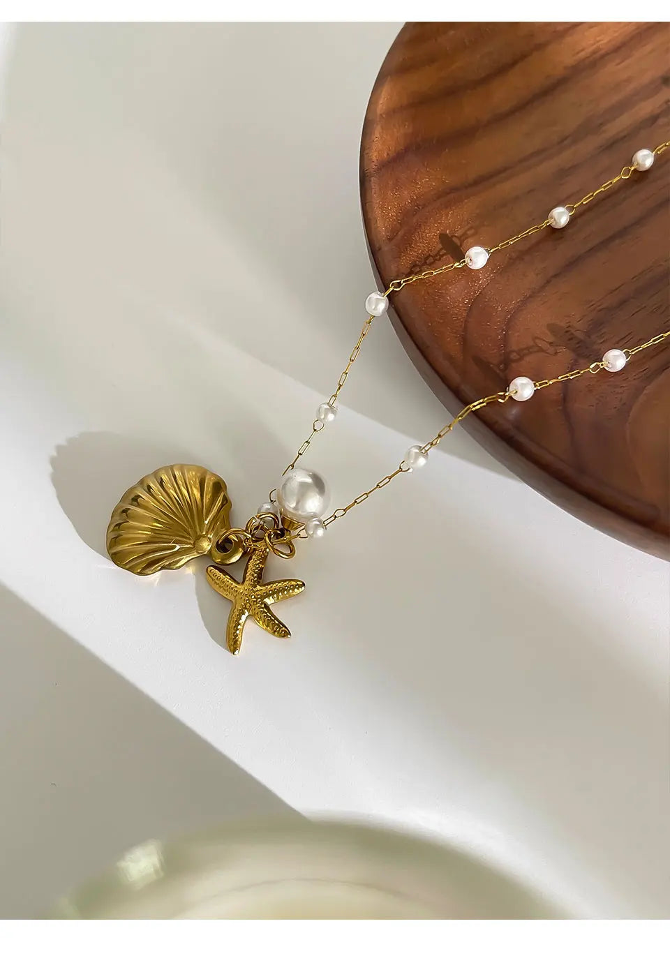 Pearl starfish shell necklace full view gold