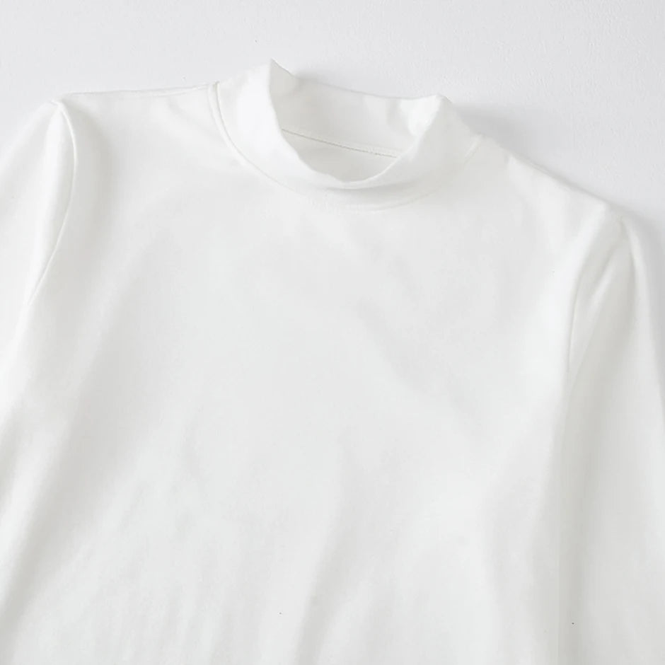 Men's semi-turtleneck long sleeve top worn under jacket