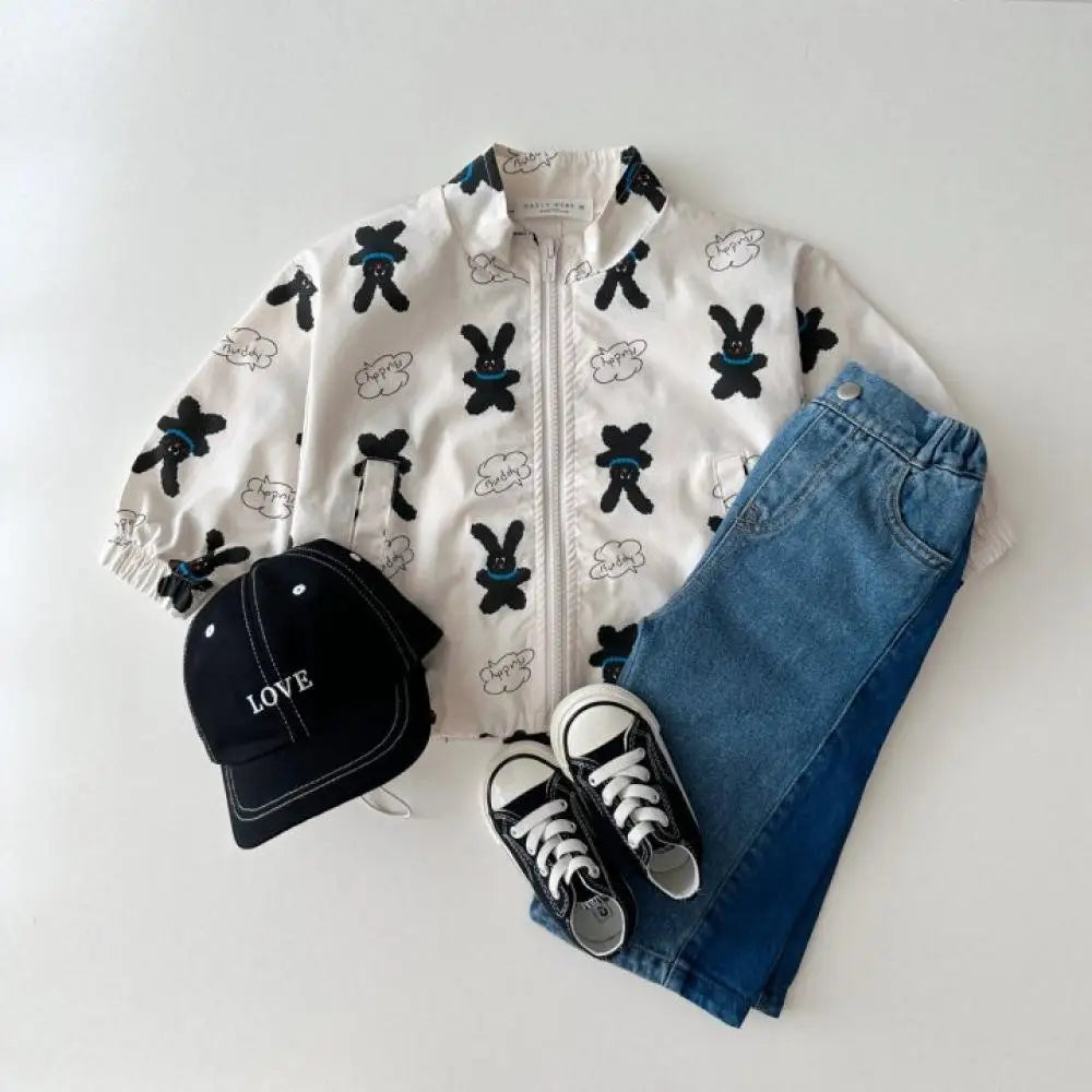 Baby cartoon print sun jacket worn by child