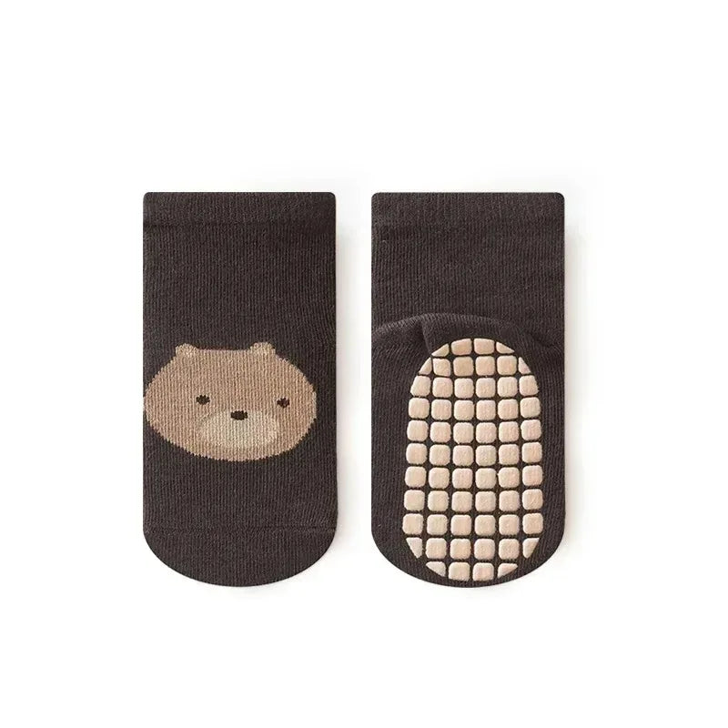 Kids non-slip socks worn on child feet