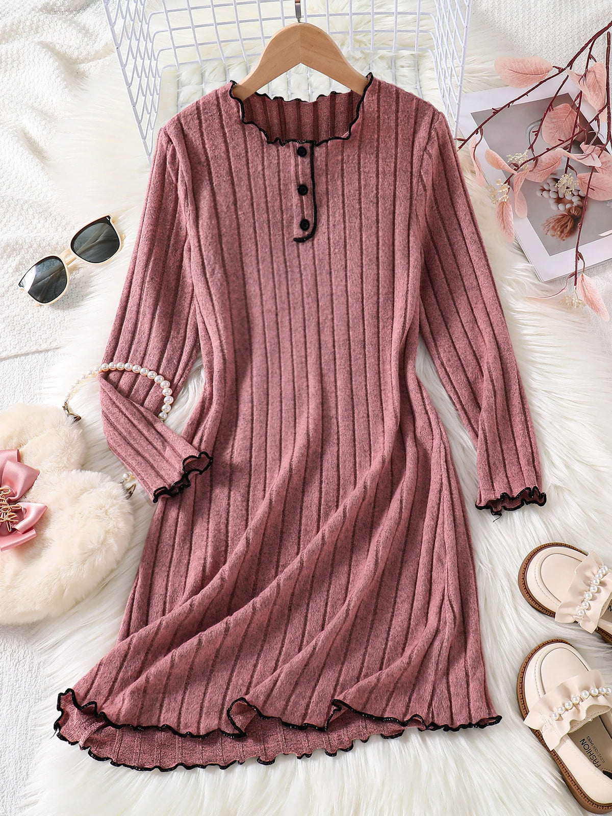 Girls knitted dress side view