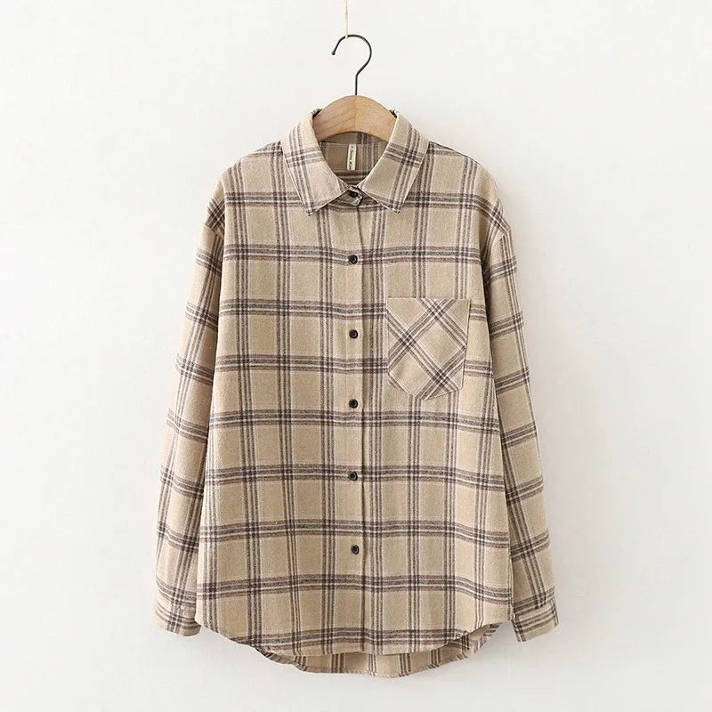 Oversized plaid shirt brown fabric texture close up