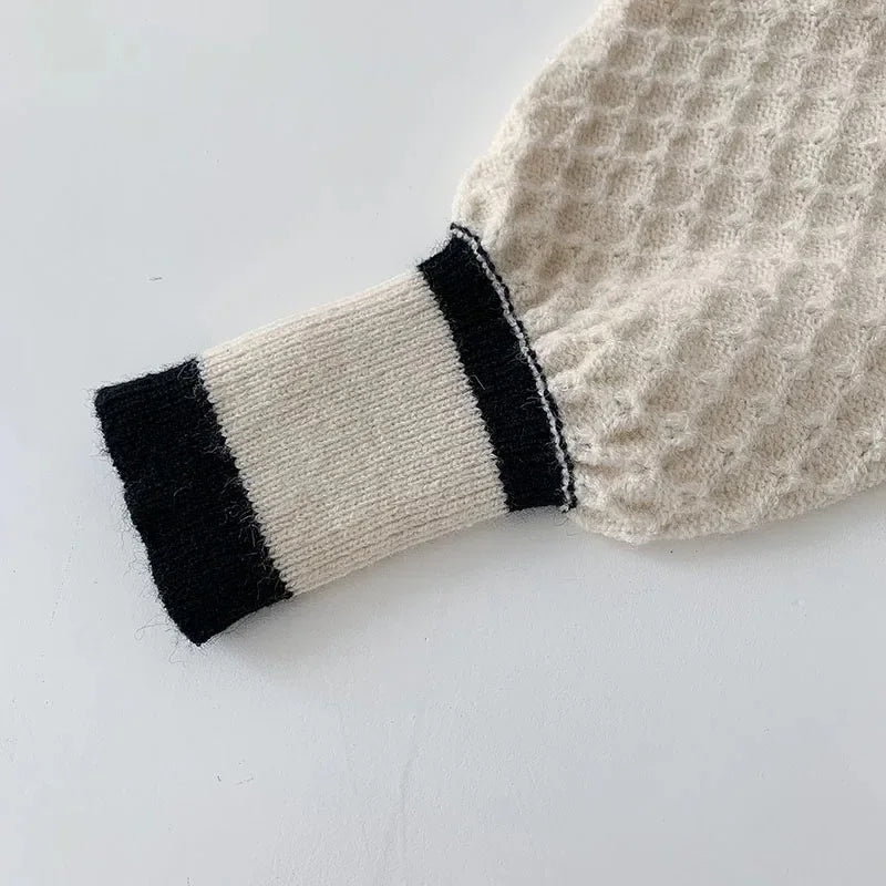 Oversized knit cardigan fabric texture closeup