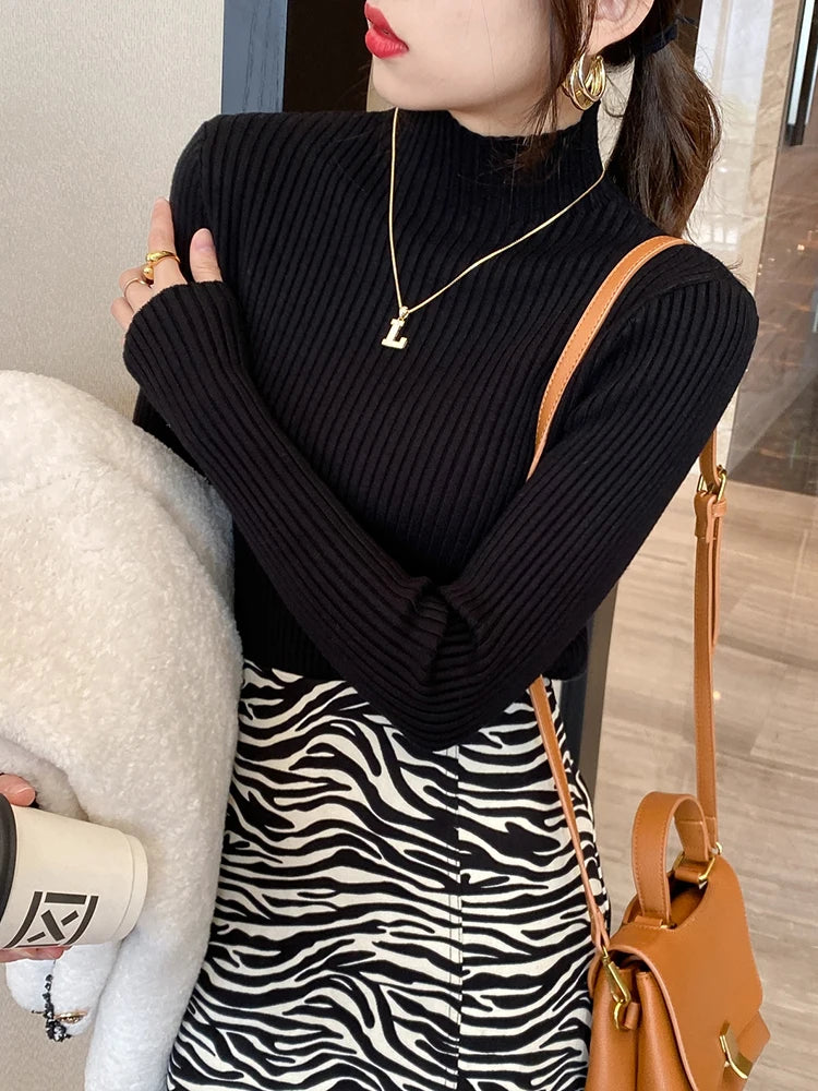 Slim turtleneck sweater black worn close up