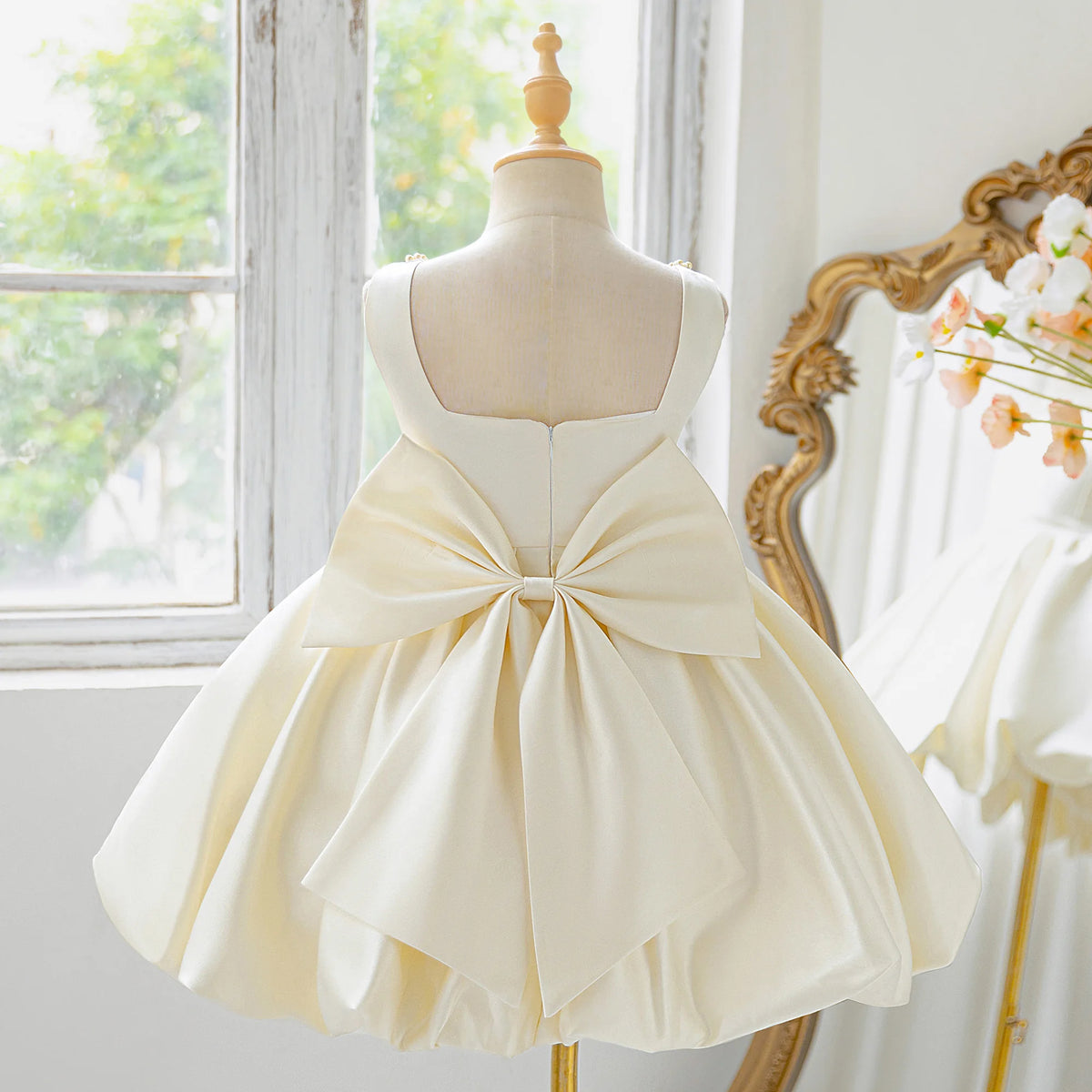 Girls bow tutu party dress worn by child