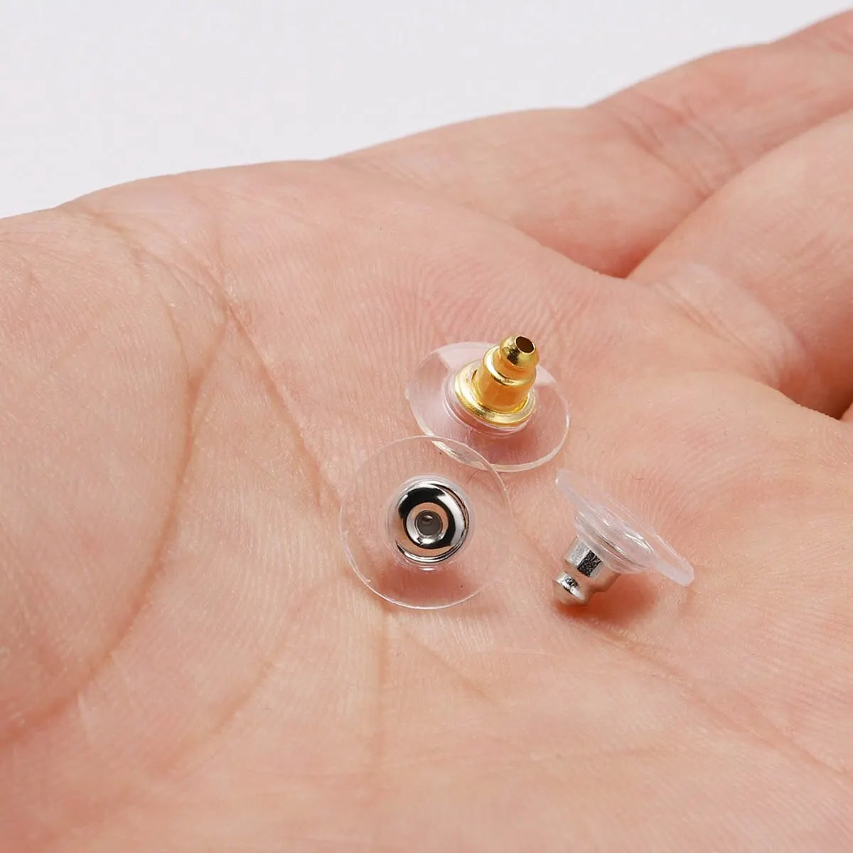 Rubber earring backs attached to earring post
