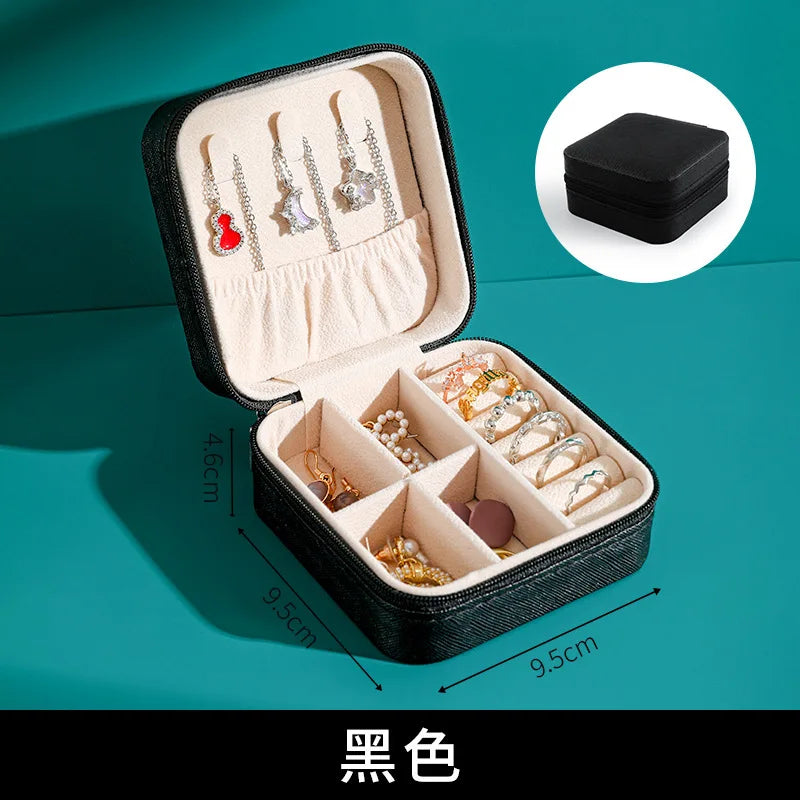 Travel jewelry organizer case interior compartments