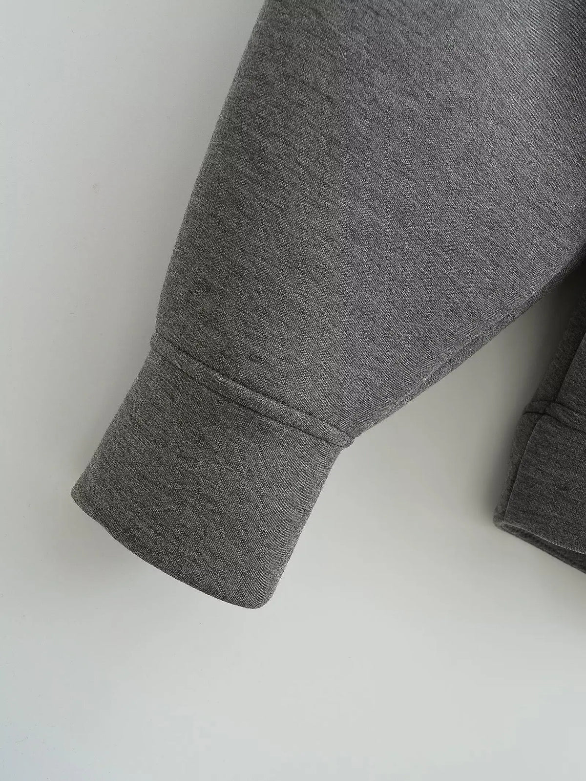 Women's zip-up hoodie jacket front view dark grey