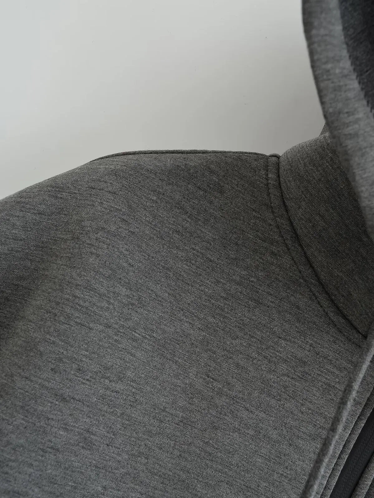 Women's zip-up hoodie jacket front view dark grey