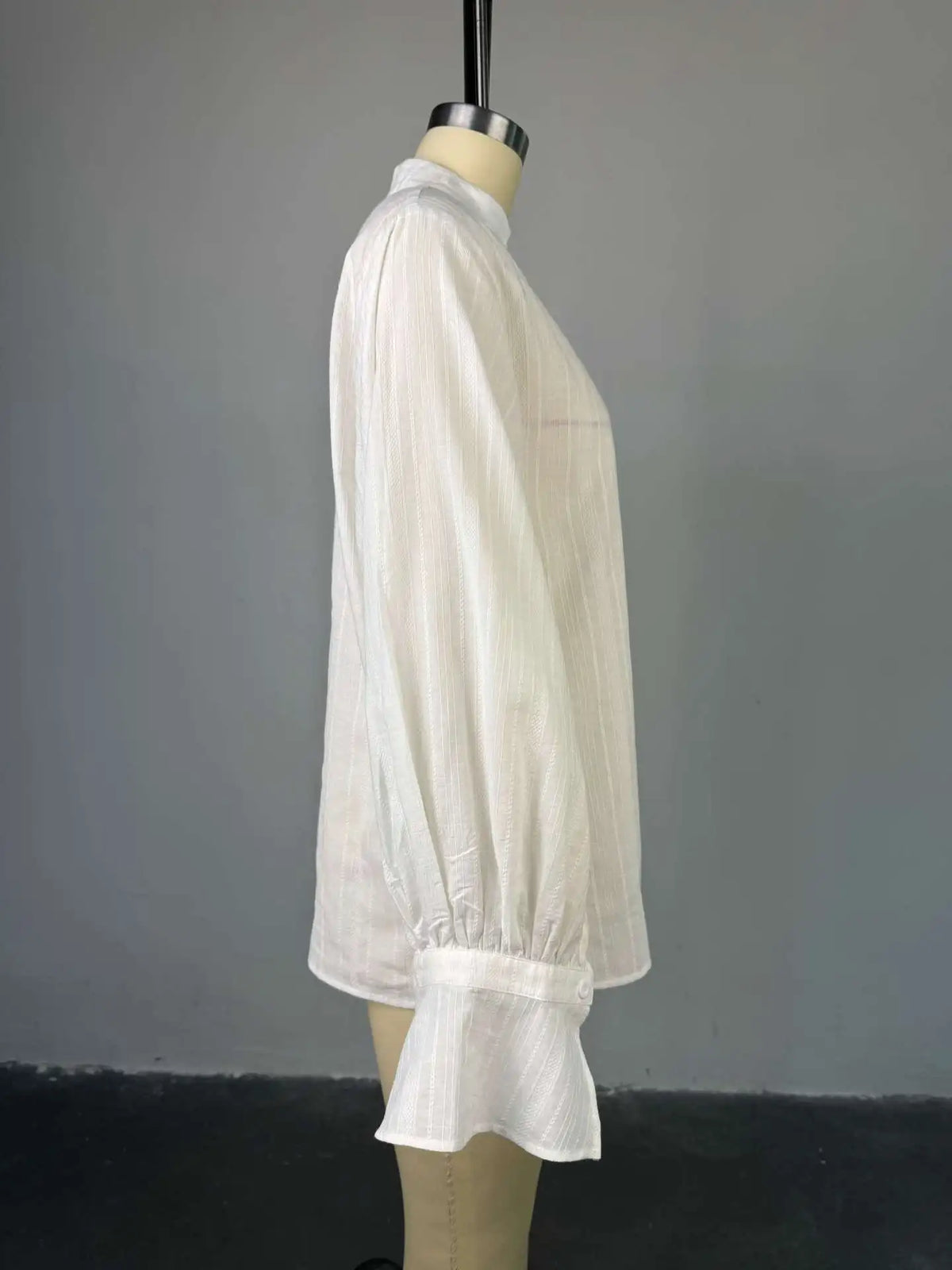 Women's oversized cotton button-up shirt worn as dress
