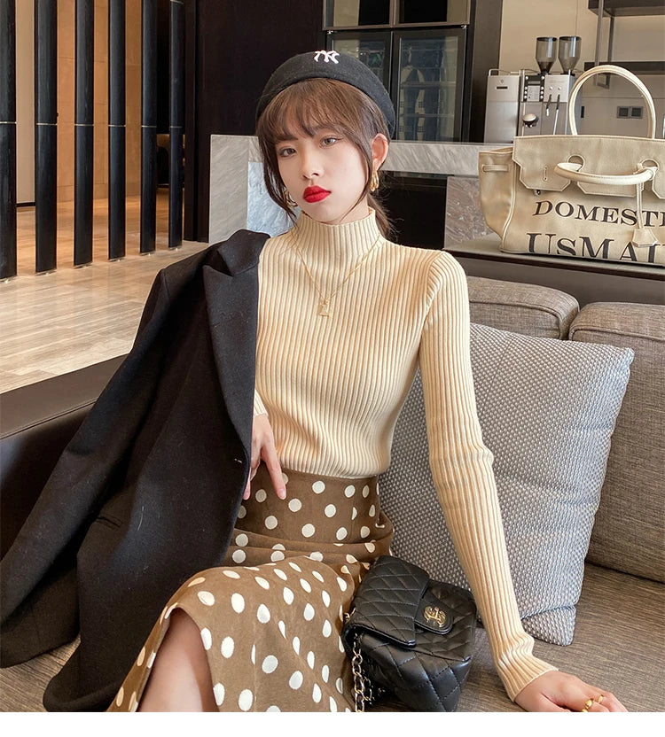 Slim turtleneck sweater beige worn full body