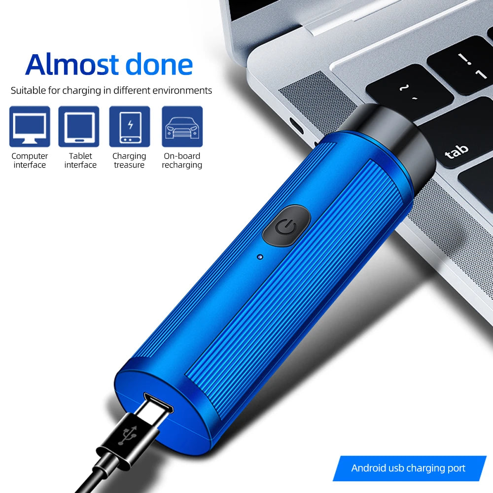Mini Rechargeable Electric Shaver shown charging via USB port, highlighting travel-friendly design.