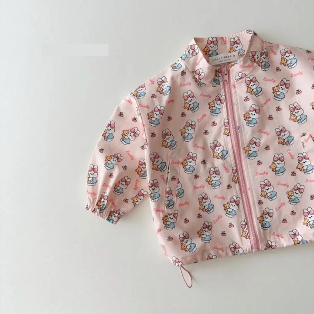Baby cartoon print sun jacket worn by child