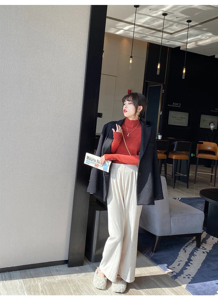  Slim turtleneck sweater khaki full body doorway