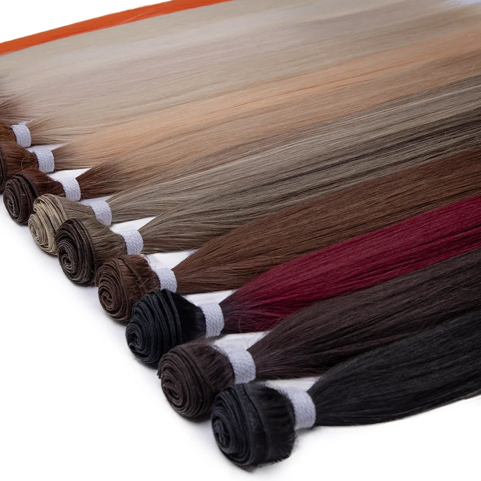 Straight synthetic hair bundle worn styled