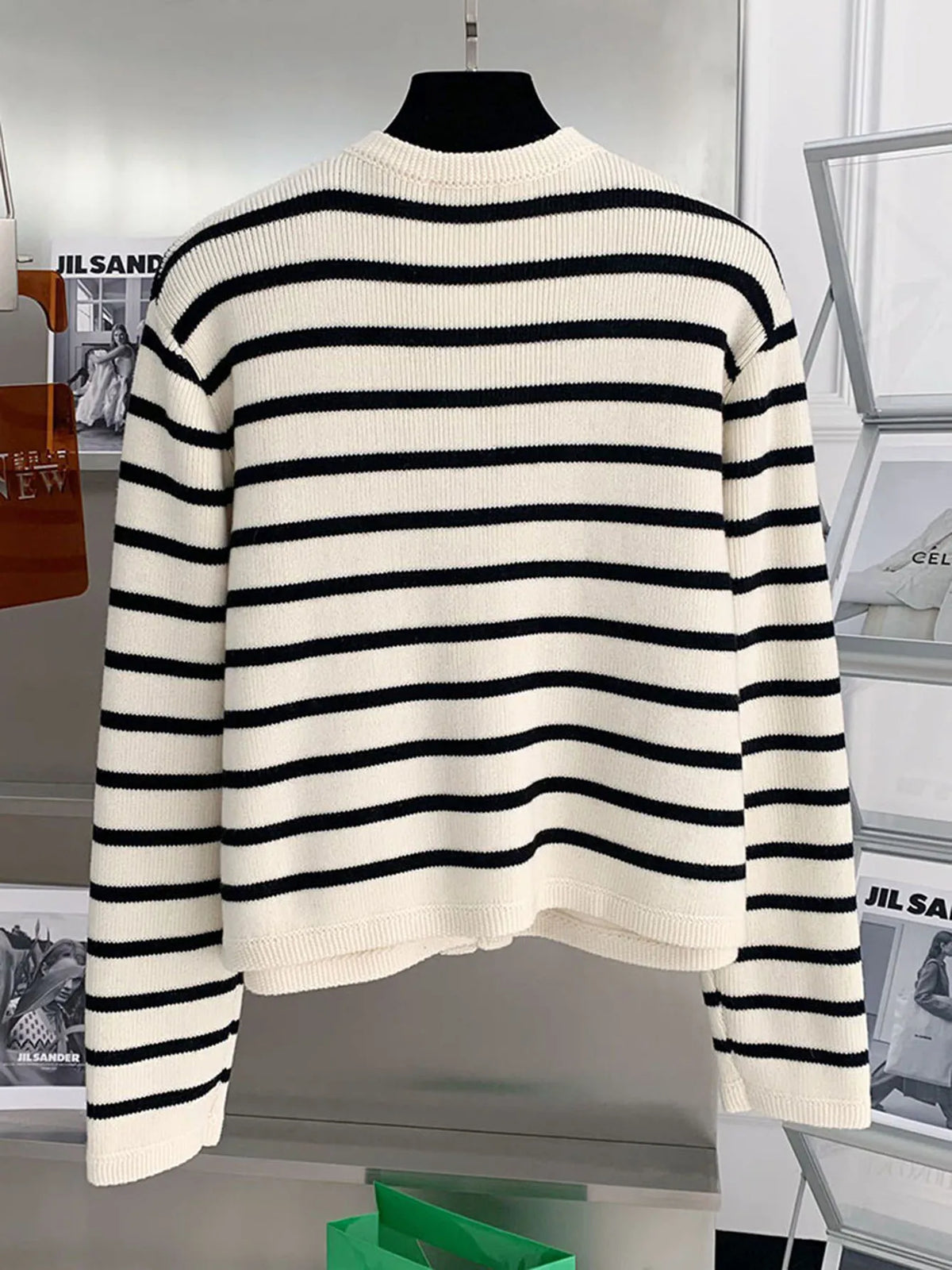 Striped cropped cardigan worn styled outfit