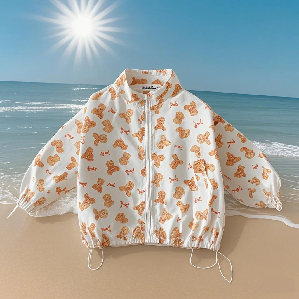 Baby cartoon print sun jacket worn by child