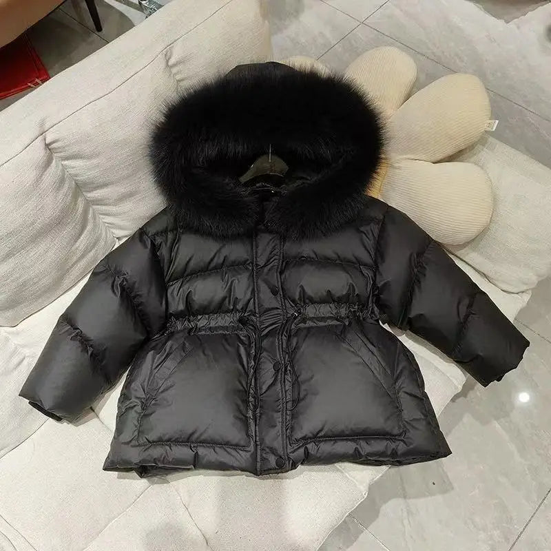 Girls fur-hood winter parka worn by child