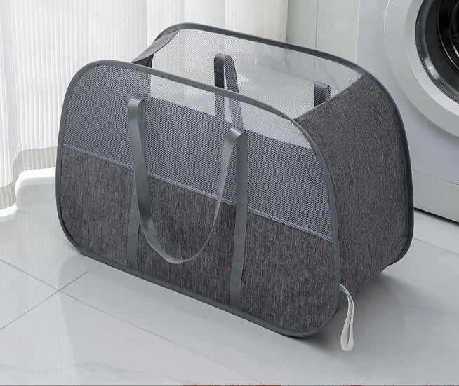 Foldable mesh laundry basket folded flat view