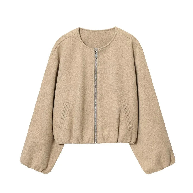 Cropped zip bomber jacket worn styled gold