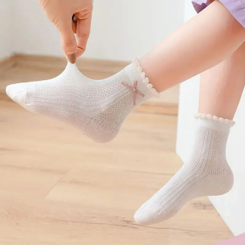 Kids cartoon socks worn on feet