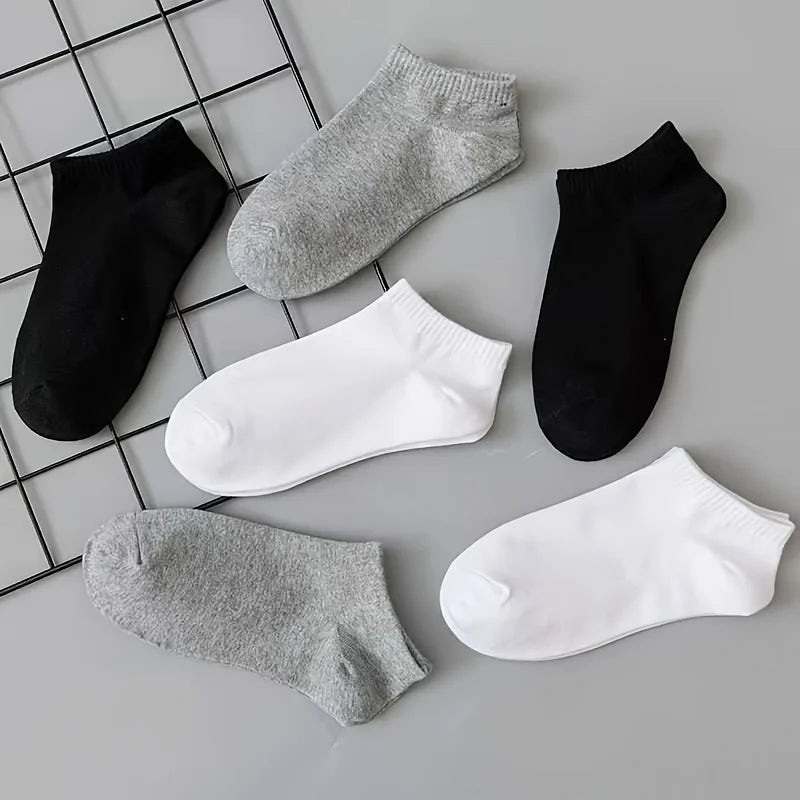 Unisex low-cut ankle socks worn on feet