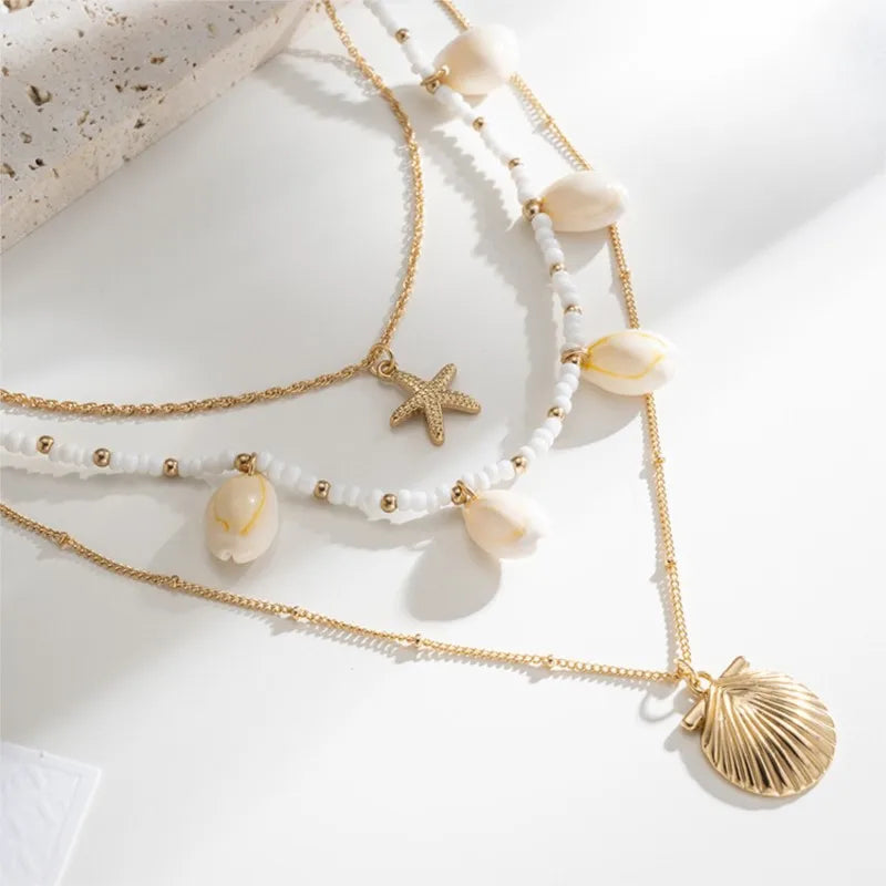 Pearl shell starfish necklace pendant close-up