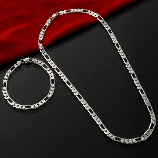 Silver chain bracelet & necklace set worn on neck