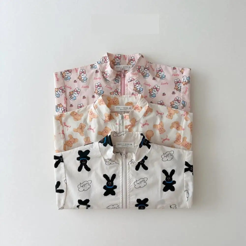 Baby cartoon print sun jacket worn by child