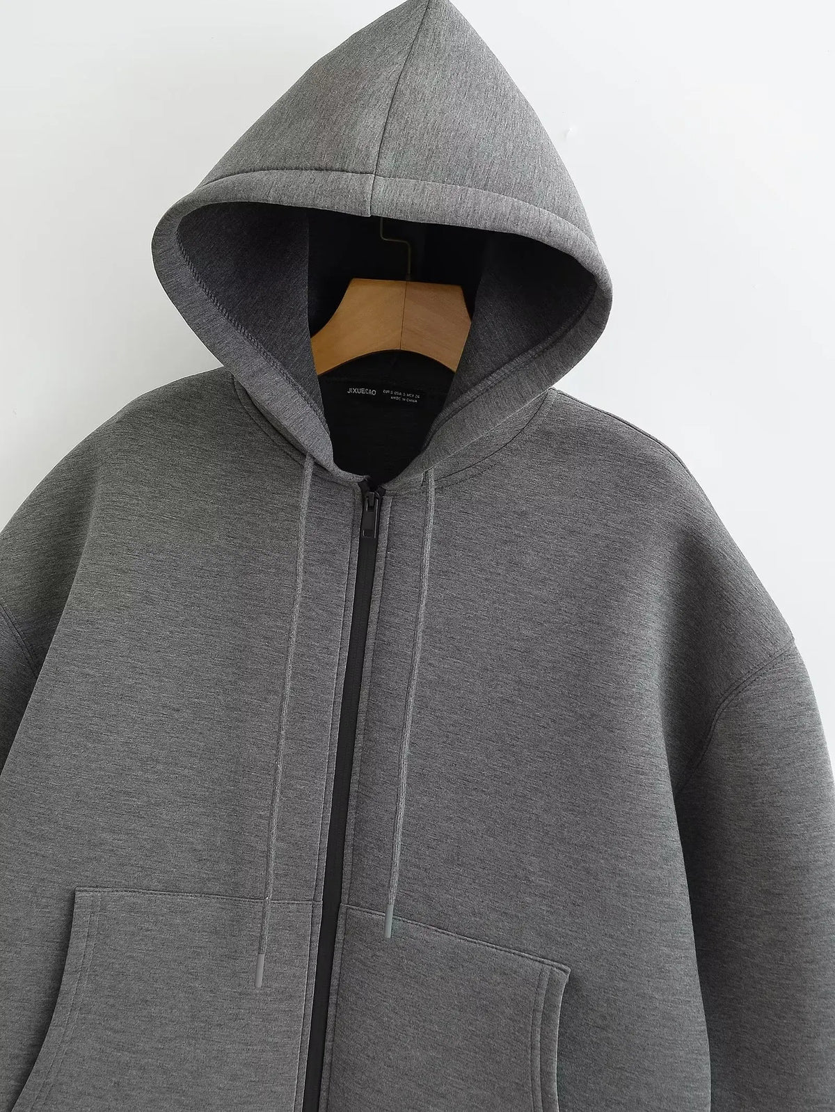 Women's zip-up hoodie jacket front view dark grey